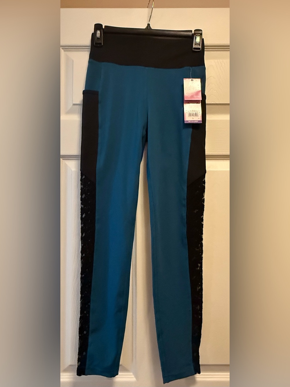 POP Fit Teal and Black women’s size small Active Leggings NWT
